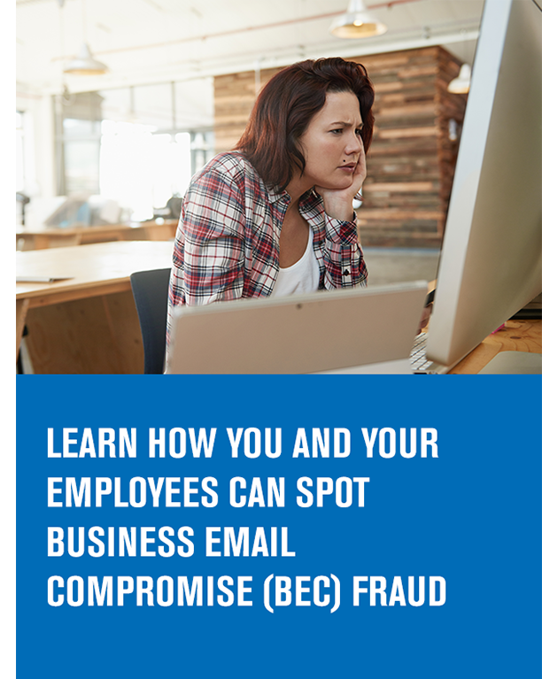 woman looking concerned while sitting at a computer with the article title text learn how you and your employees can spot business email compromise (BEC) fraud