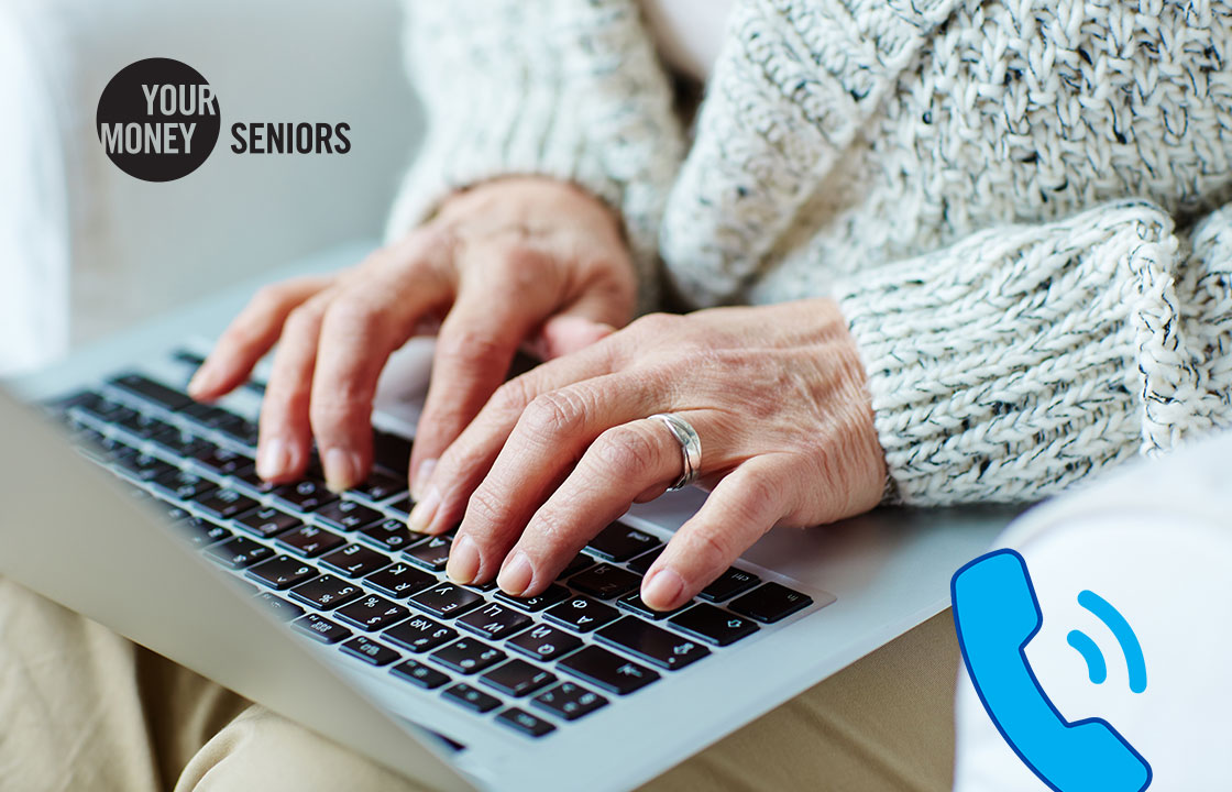 hands typing on a laptop